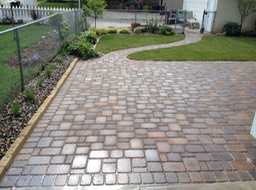 New patio and pathway to garage